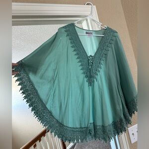 Cute sheer top. Greenish teal.